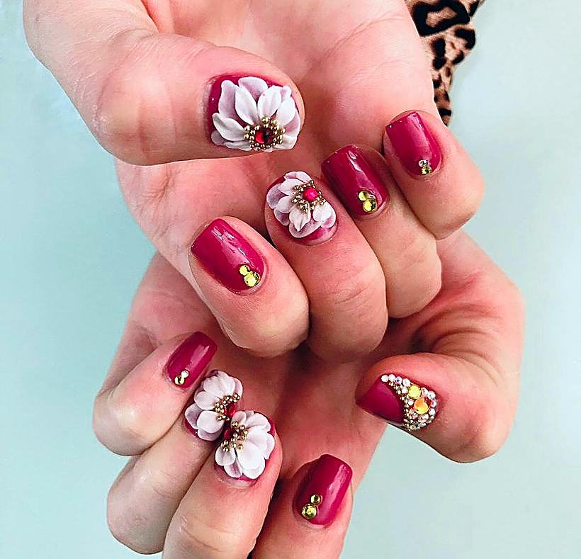 Burgundy gel nails with 3D flowers – Ellie Beauty, Singapore
