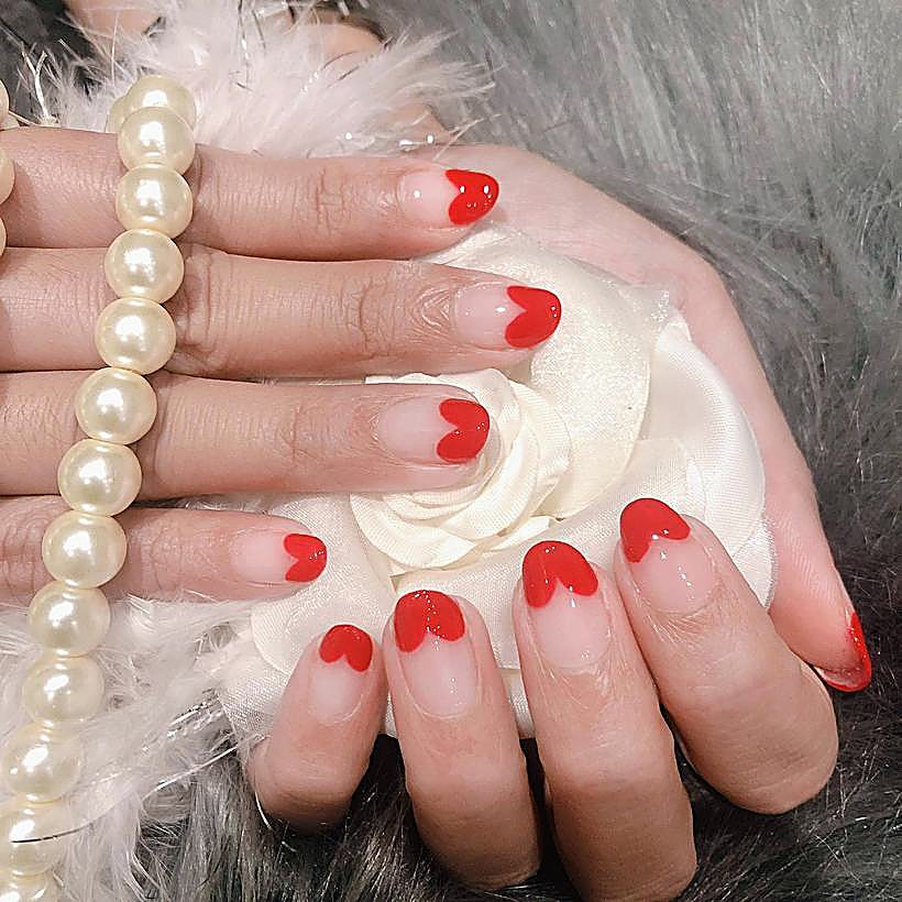 Heart-tip red gel nails – Ellie Beauty, Singapore